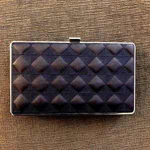Sondra Roberts clutch dinner/wedding